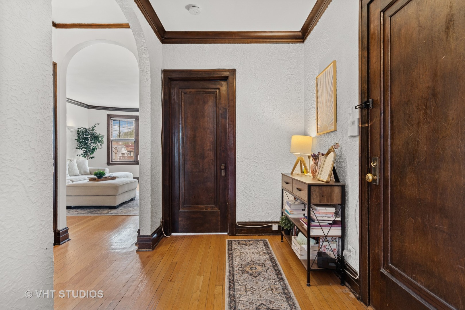 7 Fillmore Street, Unit 2 Oak Park, IL 60304 - Photo 5 of 27 a view of a hallway and a livingroom with furniture