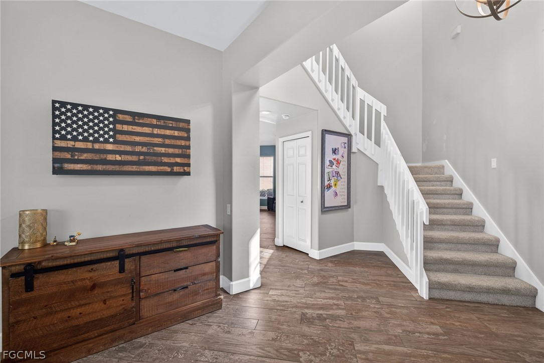 22866 Forest Ridge Drive Estero, FL 33928 - Photo 16 of 38 a view of entryway and hall with wooden floor