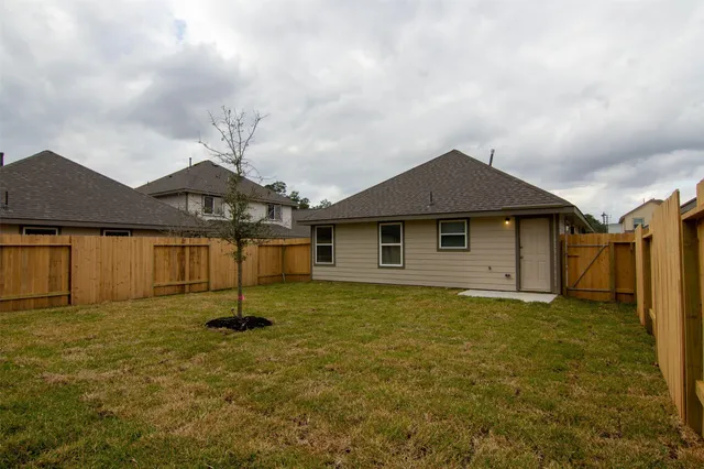 a house with garden in front of it