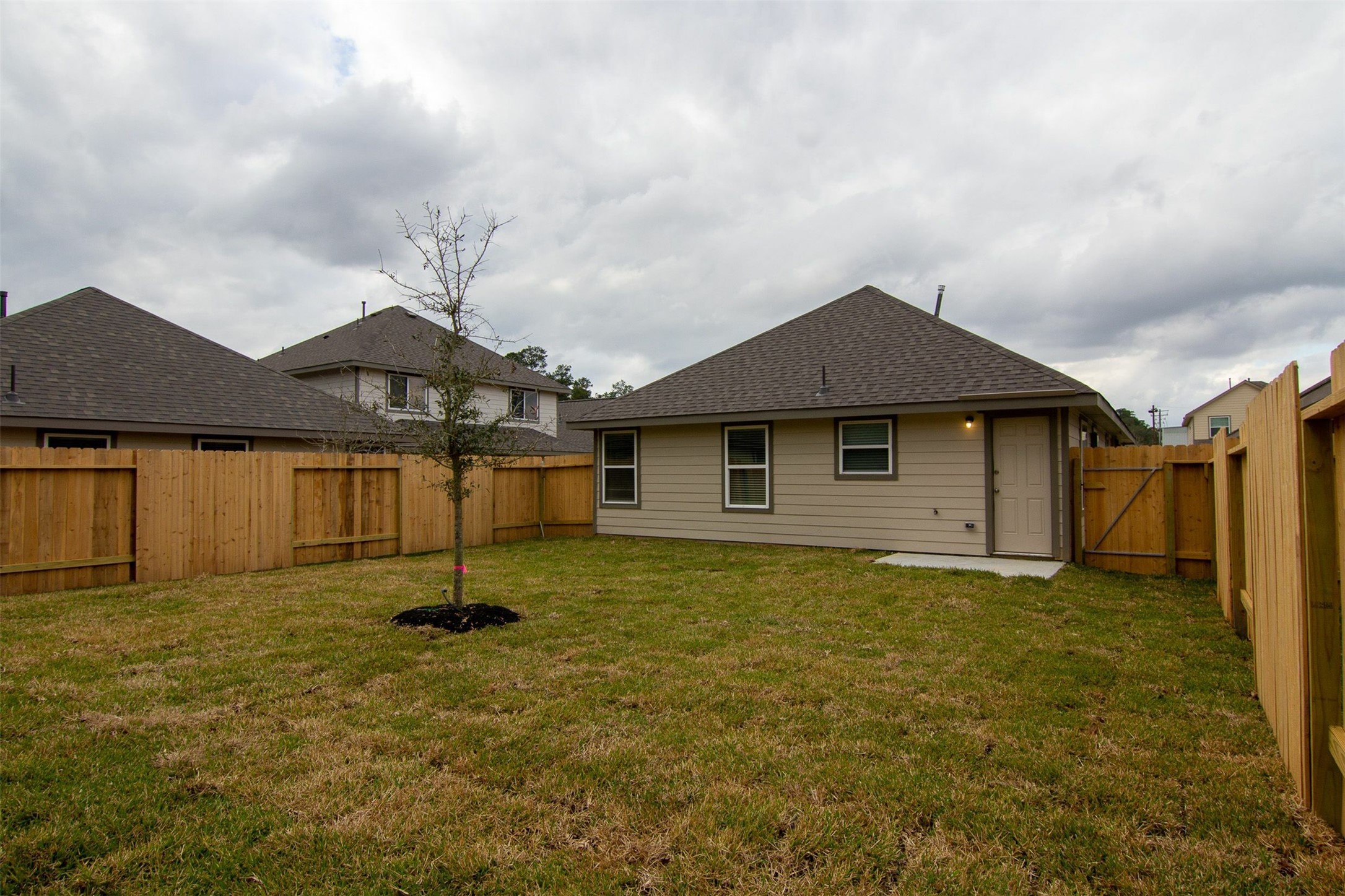 3708 Alexus Drive Conroe, TX 77301 - Photo 4 of 20 a house with garden in front of it