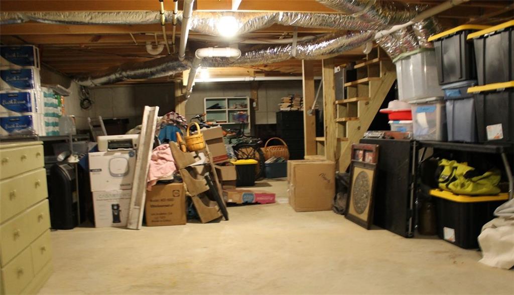765 Addison Road Buchanan, GA 30113 - Photo 27 of 34 a view of a storage room with clothes