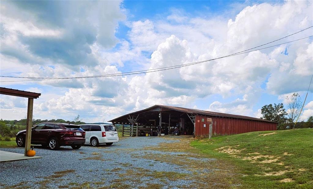 765 Addison Road Buchanan, GA 30113 - Photo 5 of 34 a view of street with parked cars