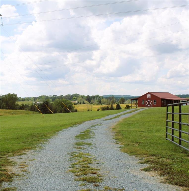 765 Addison Road Buchanan, GA 30113 - Photo 10 of 34 a view of an ocean and a yard