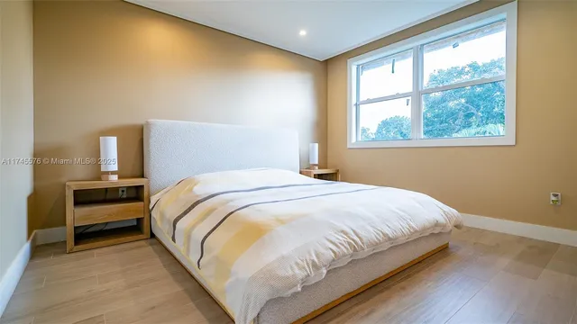 a bathroom with a toilet and a bathtub
