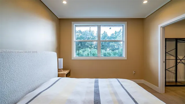 an empty room with a empty space and window