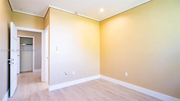 a living room with furniture and a yard