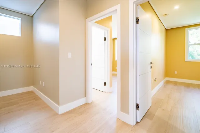 a view of a yard and patio in the back yard