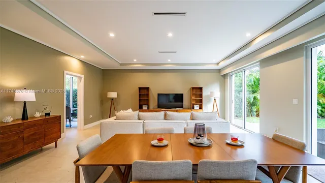 a living room with a couch and a flat screen tv