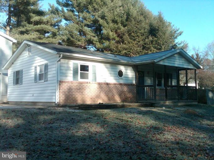 1846 Tank Road Finksburg, MD 21048 - Photo 1 of 6 a view of a house with a yard