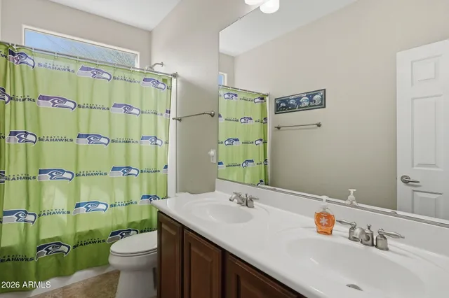 a view of a dining room with furniture and a potted plant