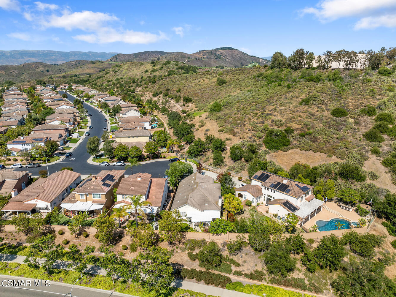 4213 Persimmon Street Moorpark, CA 93021 - Photo 4 of 5 an aerial view of residential houses with outdoor space