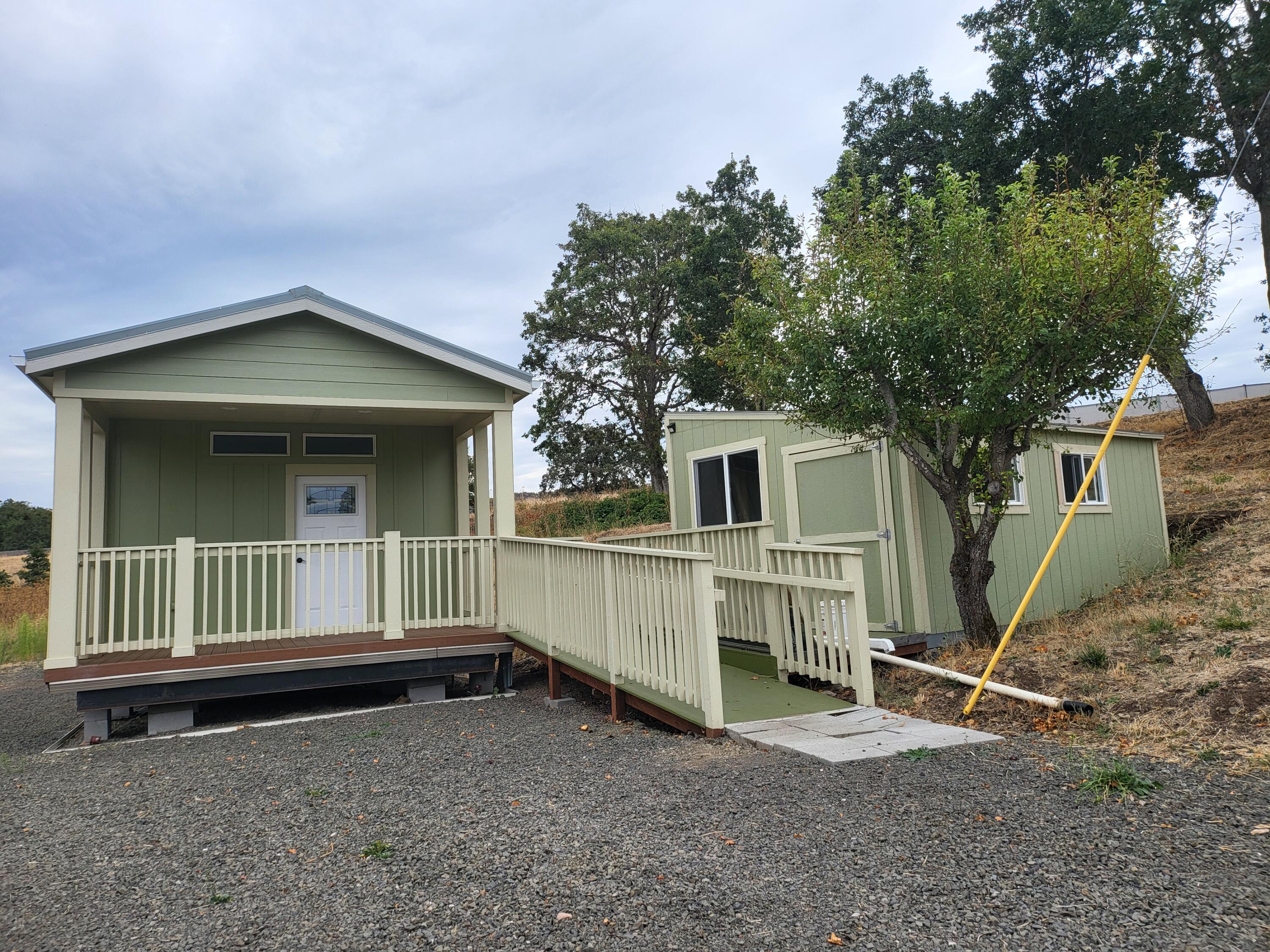 4898 Antelope Road Eagle Point, OR 97524 - Photo 1 of 29 Front of Home with Handicap Ramp, Tuff Shed to the right of Ramp