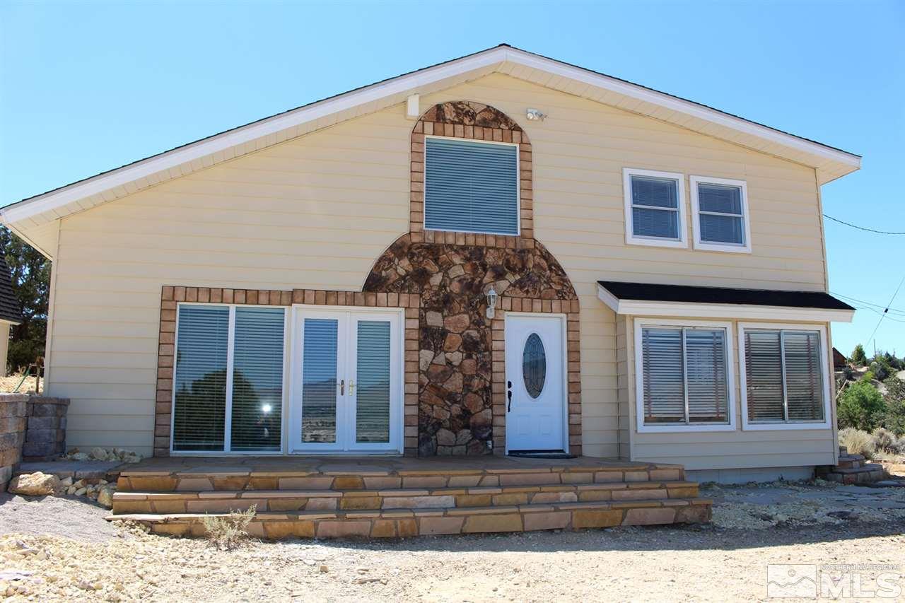 15380 Yankee Blade Road Reno, NV 89521 - Photo 1 of 40 a front view of a house