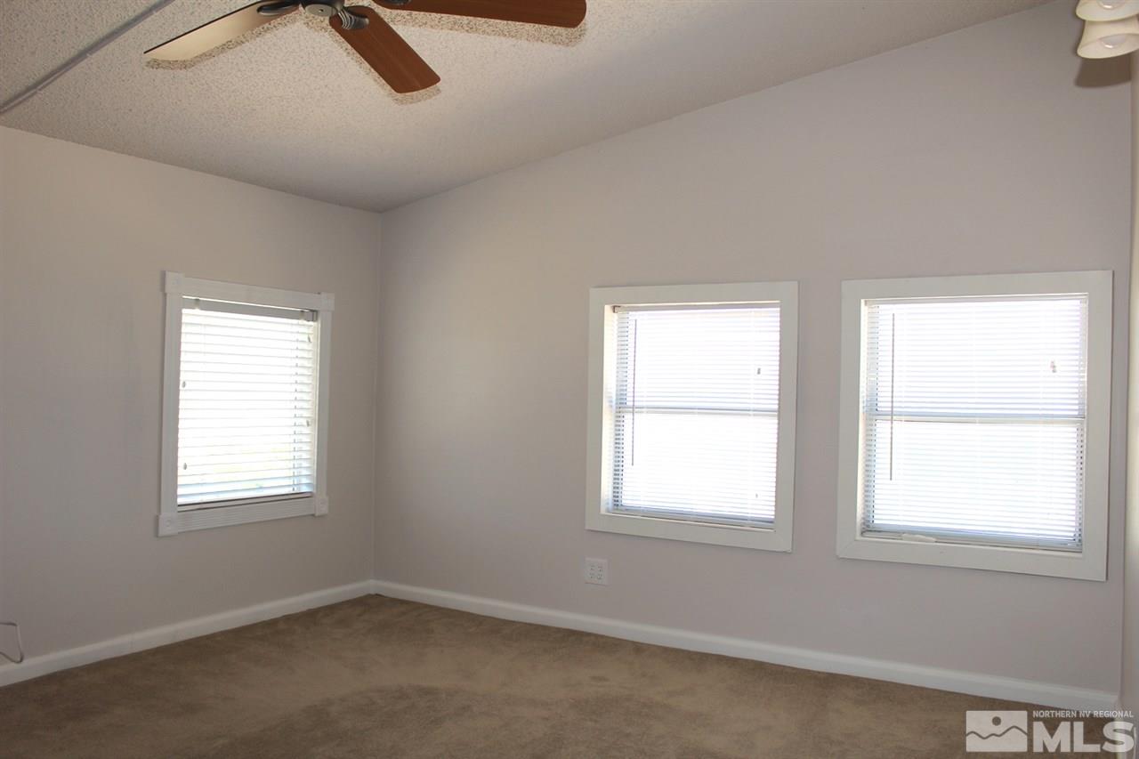 15380 Yankee Blade Road Reno, NV 89521 - Photo 18 of 40 an empty room with a window