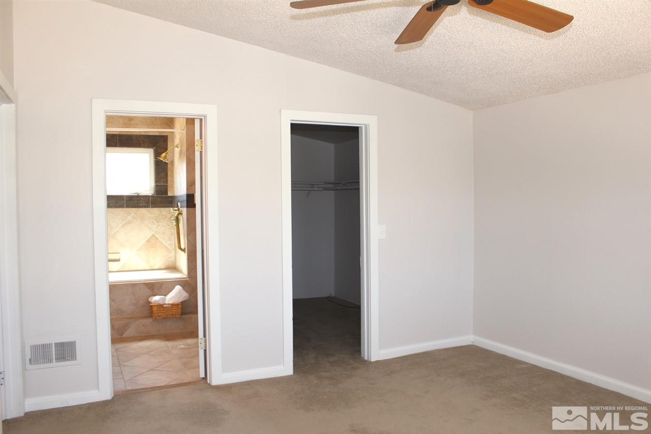 15380 Yankee Blade Road Reno, NV 89521 - Photo 19 of 40 an empty room and a window