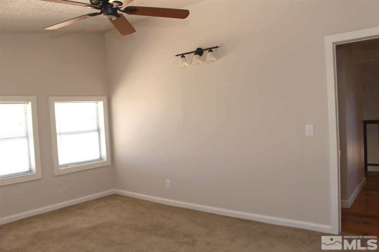 15380 Yankee Blade Road Reno, NV 89521 - Photo 20 of 40 an empty room with a window