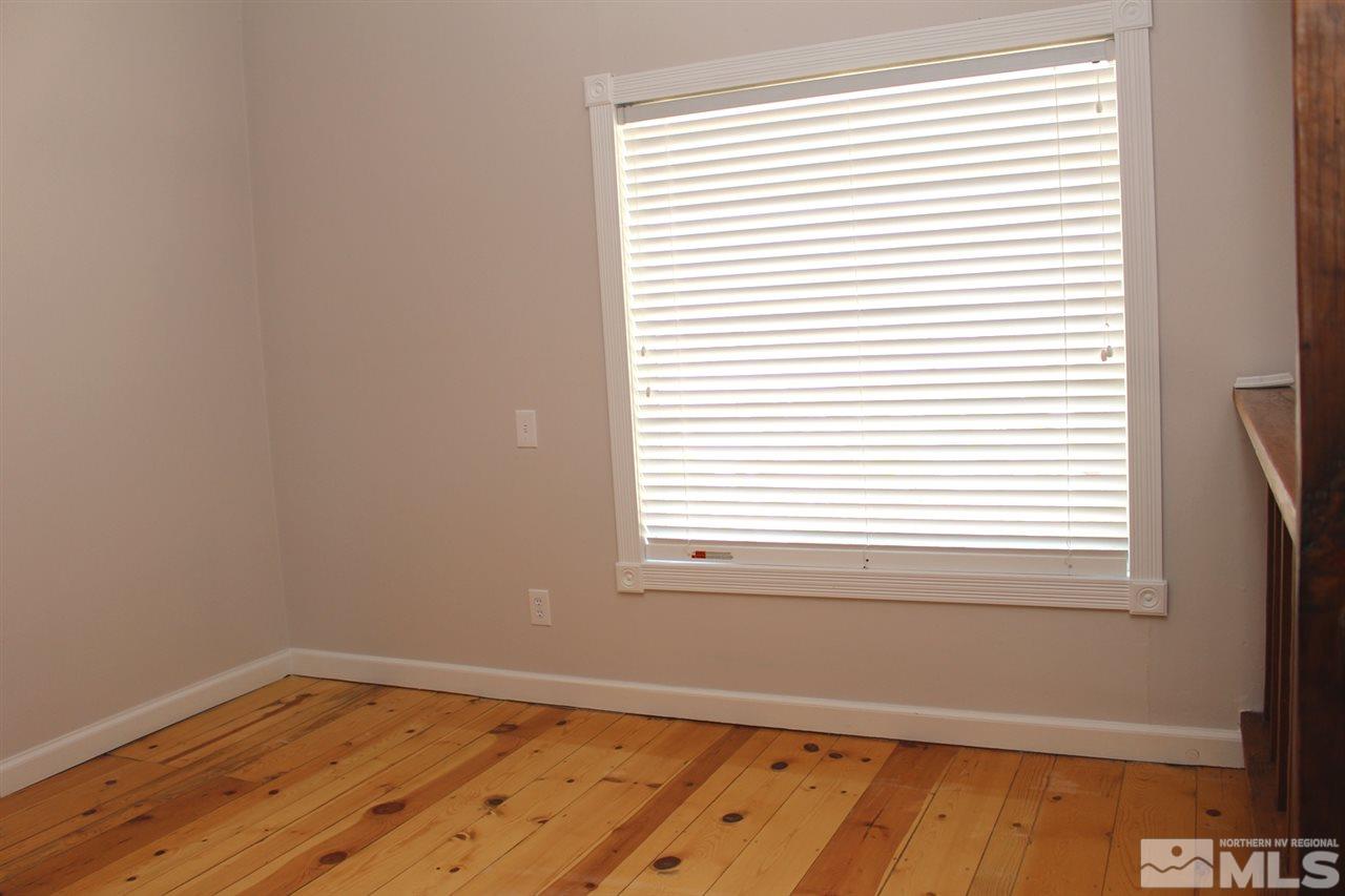 15380 Yankee Blade Road Reno, NV 89521 - Photo 26 of 40 an empty room with a window