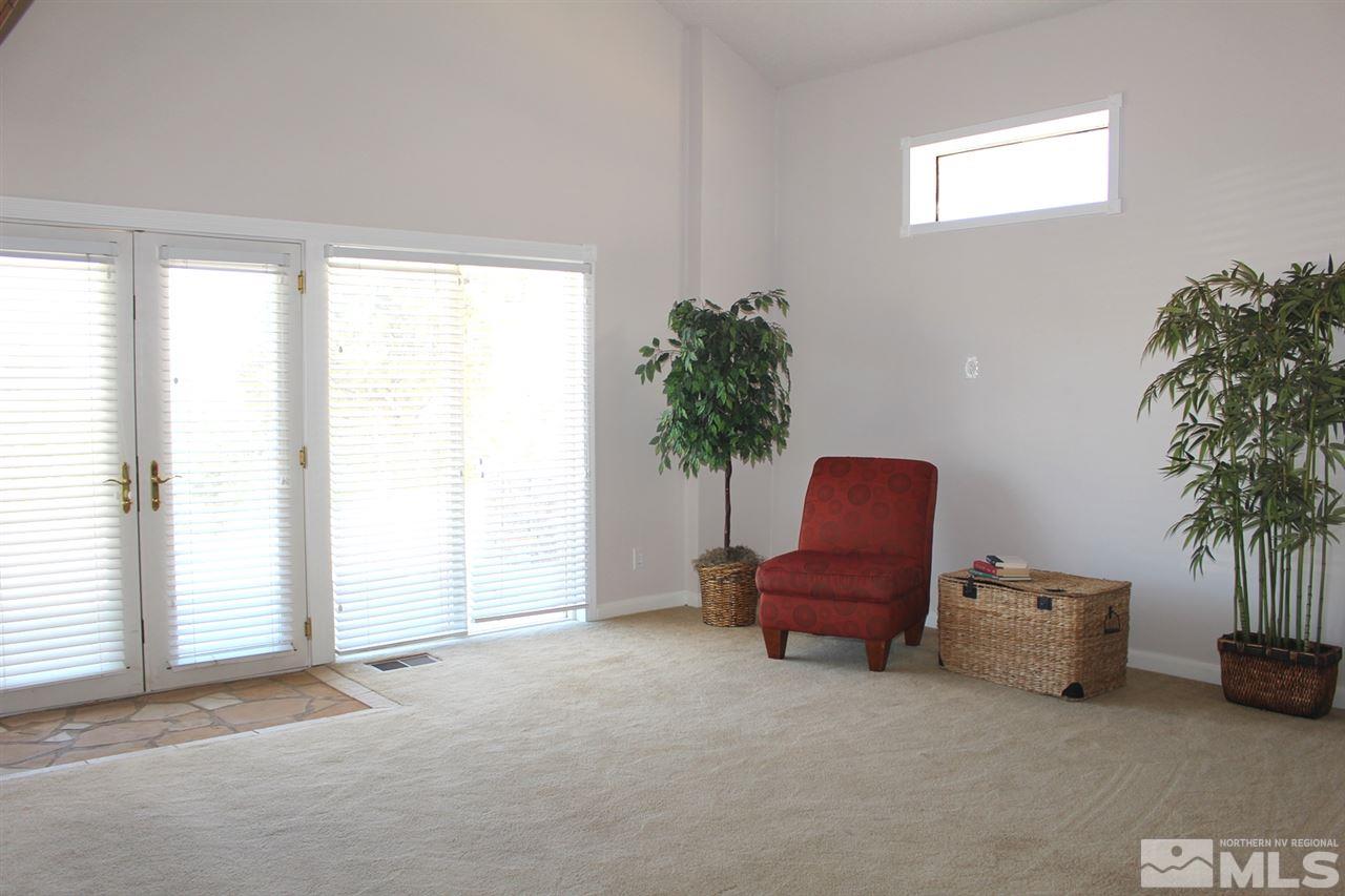 15380 Yankee Blade Road Reno, NV 89521 - Photo 3 of 40 a living room with furniture and a potted plant