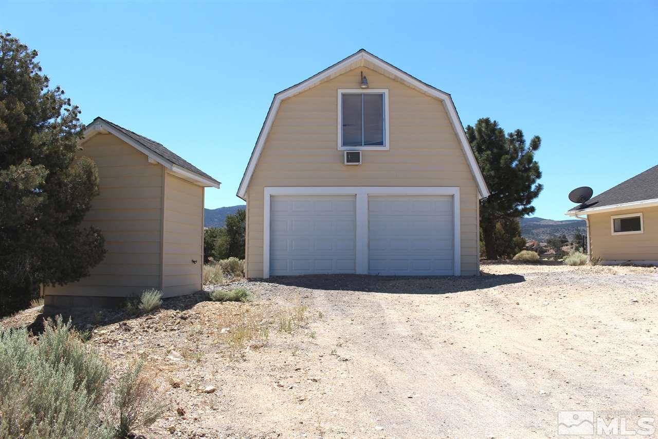 15380 Yankee Blade Road Reno, NV 89521 - Photo 38 of 40 a view of a house with a yard