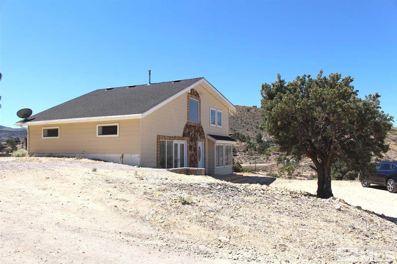 15380 Yankee Blade Road Reno, NV 89521 - Photo 39 of 40 a front view of a house with a yard