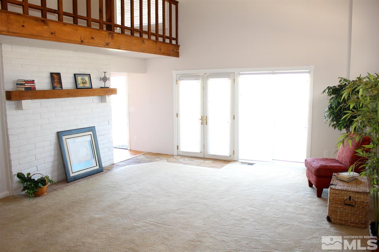 15380 Yankee Blade Road Reno, NV 89521 - Photo 4 of 40 a view of livingroom with furniture and a window