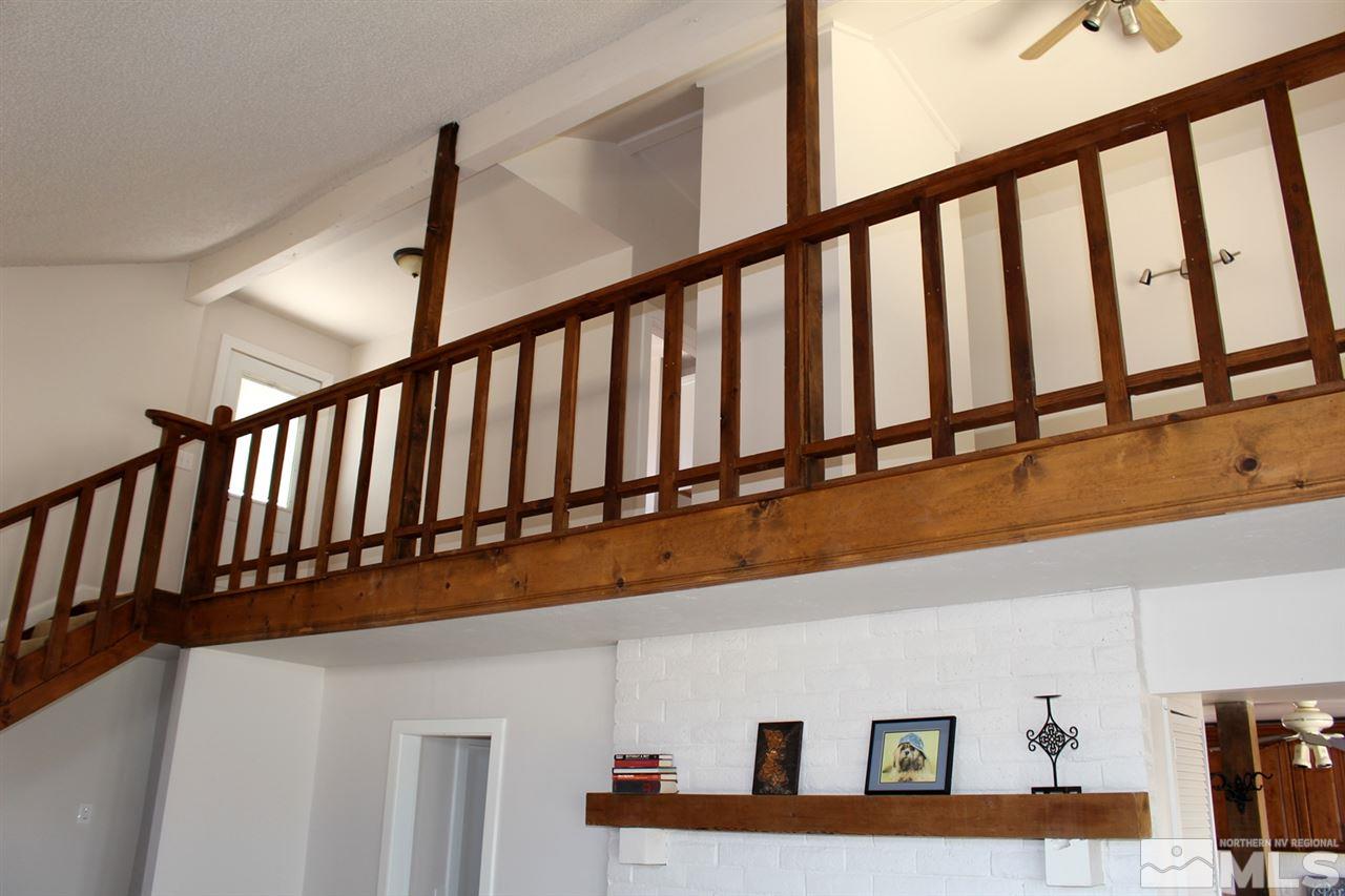 15380 Yankee Blade Road Reno, NV 89521 - Photo 8 of 40 a view of staircase with a window