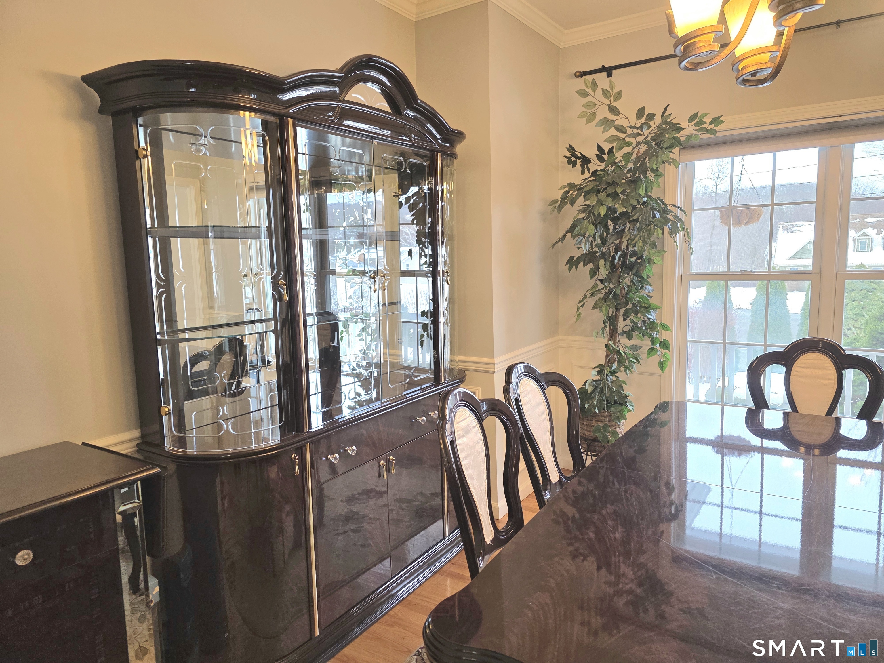 83 Robin Street Bristol, CT 06010 - Photo 8 of 9 a front view of a house with outdoor seating