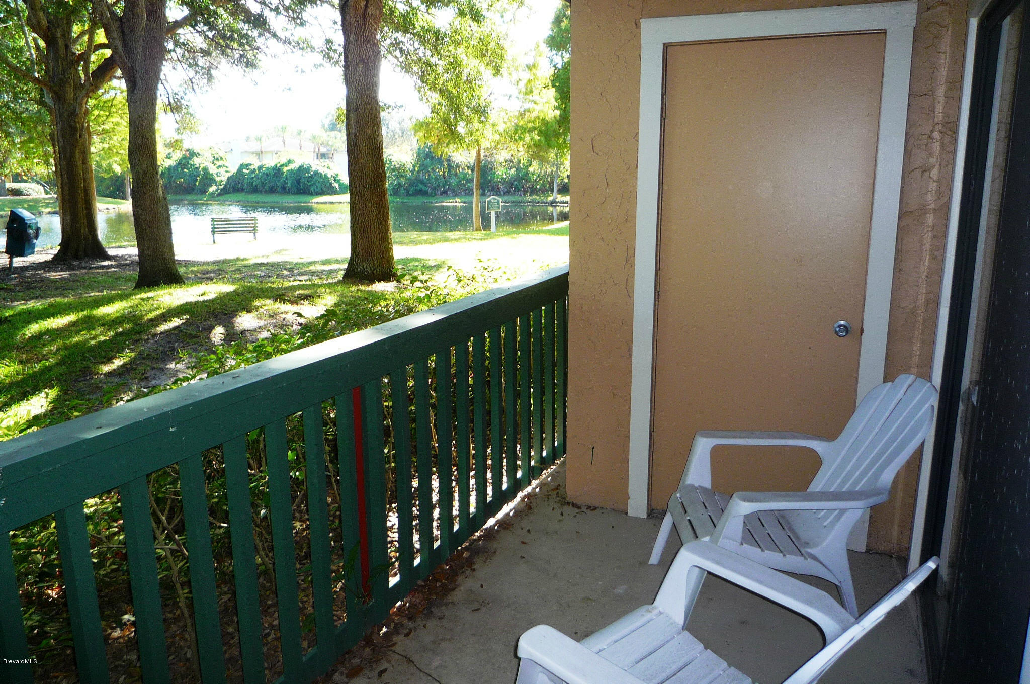 7667 North Wickham Road, Unit 608 Melbourne, FL 32940 - Photo 2 of 25 Patio with Lake View