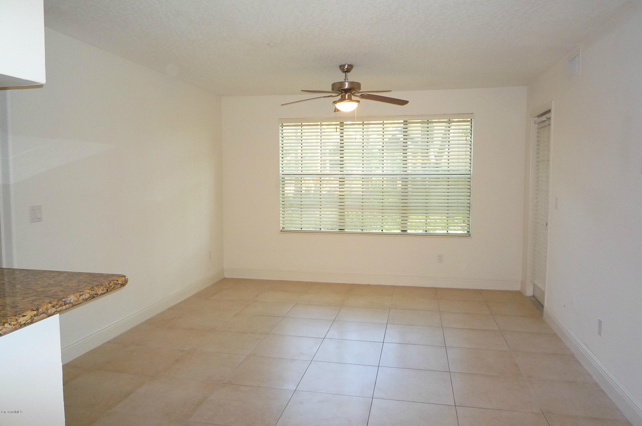 7667 North Wickham Road, Unit 608 Melbourne, FL 32940 - Photo 4 of 25 Family Room (2)