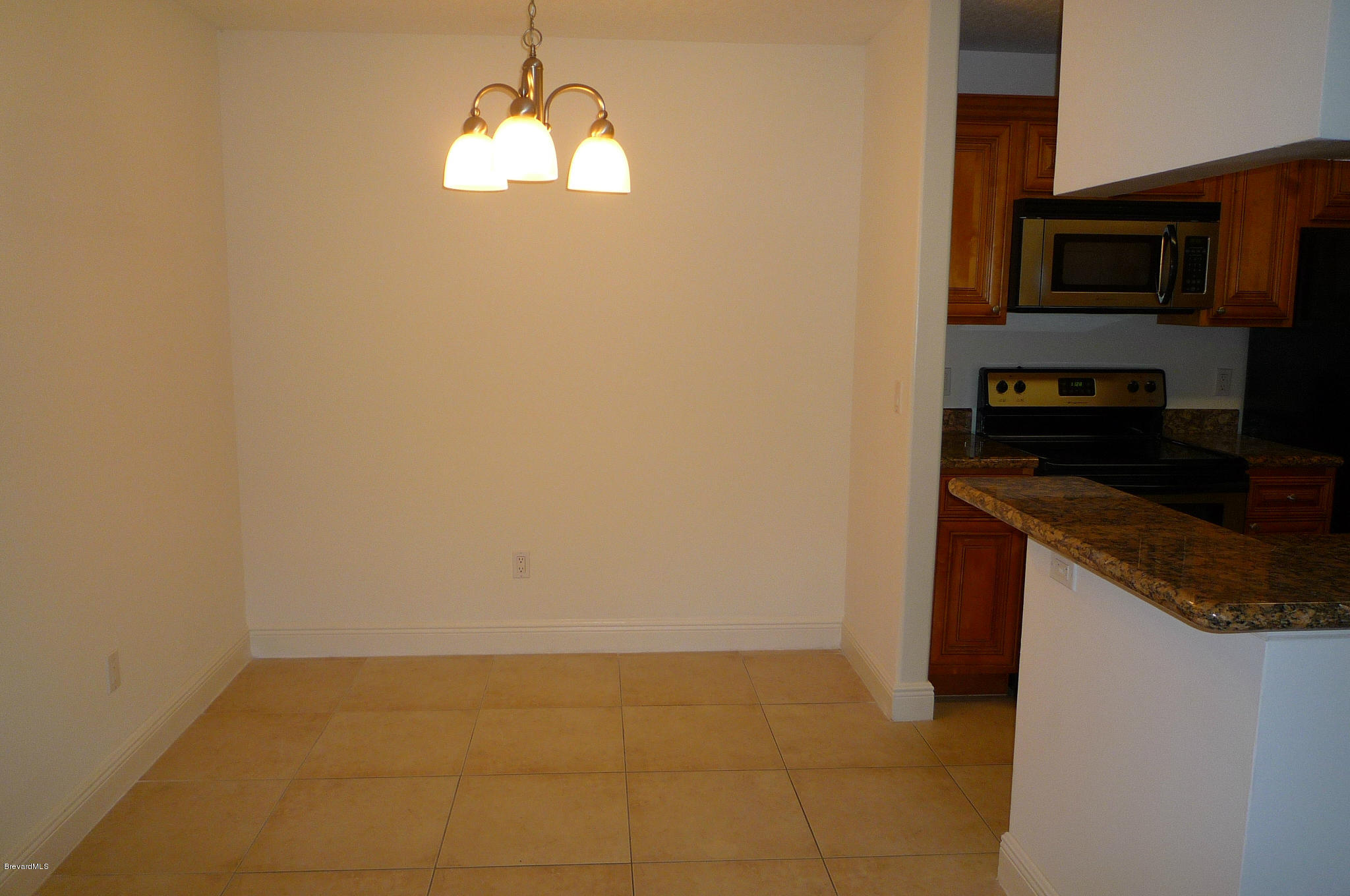 7667 North Wickham Road, Unit 608 Melbourne, FL 32940 - Photo 5 of 25 Dining Area