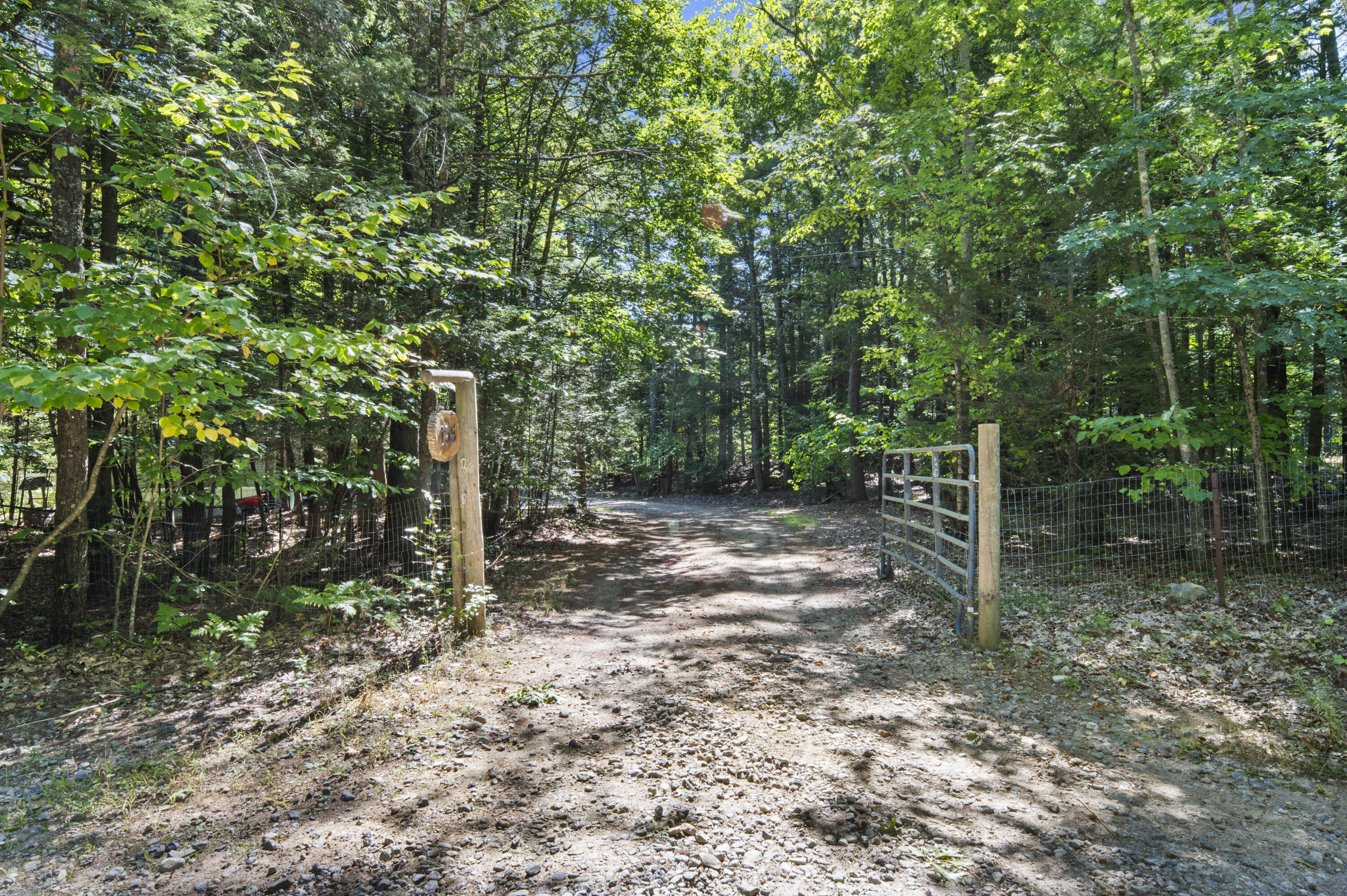 195 Oak Hill Road Lebanon, ME 04027 - Photo 2 of 28 Gated Driveway Entrance