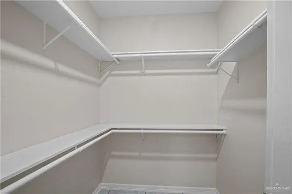 a view of an empty walk in closet
