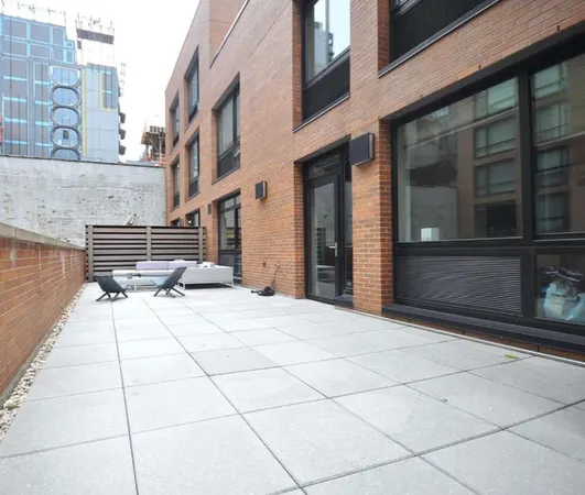 a view of a building with a bench