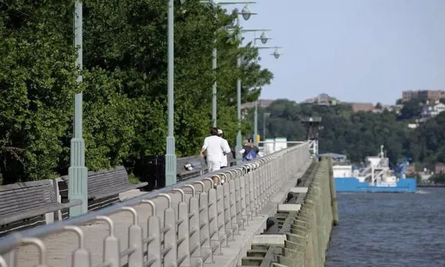 a view of a balcony with two chairs