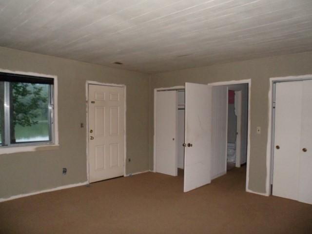 796 Lake Logan Road Ardmore, TN 38449 - Photo 9 of 14 a view of an empty room with a window