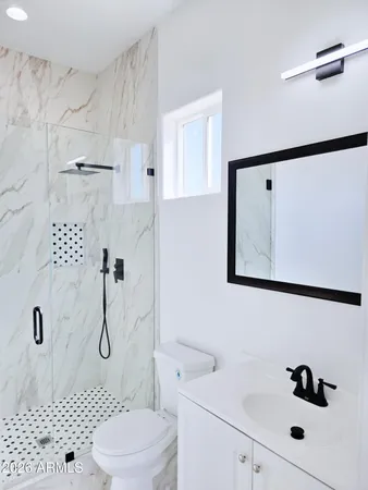 an empty room with a empty space and a ceiling fan