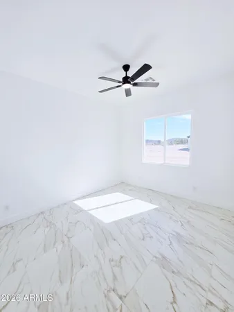 a view of a brick house with a wooden floor