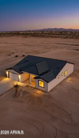 a view of a kitchen with a sink and microwave
