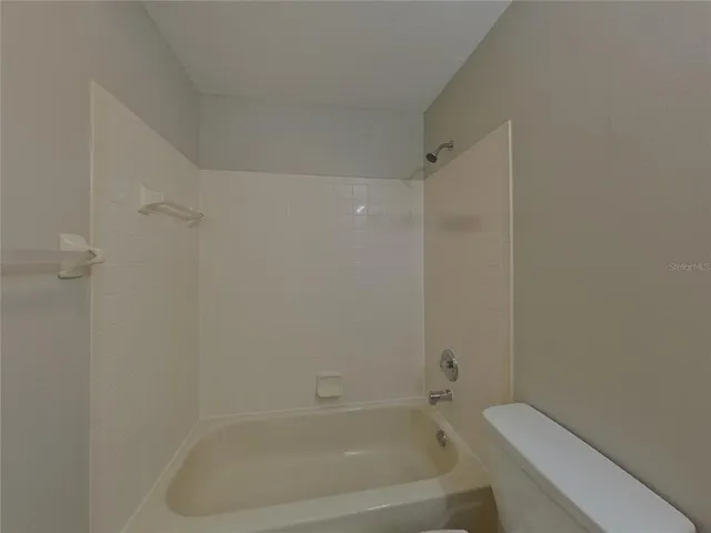 a close view of a bathtub in bathroom