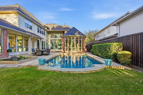 a view of a house with a swimming pool