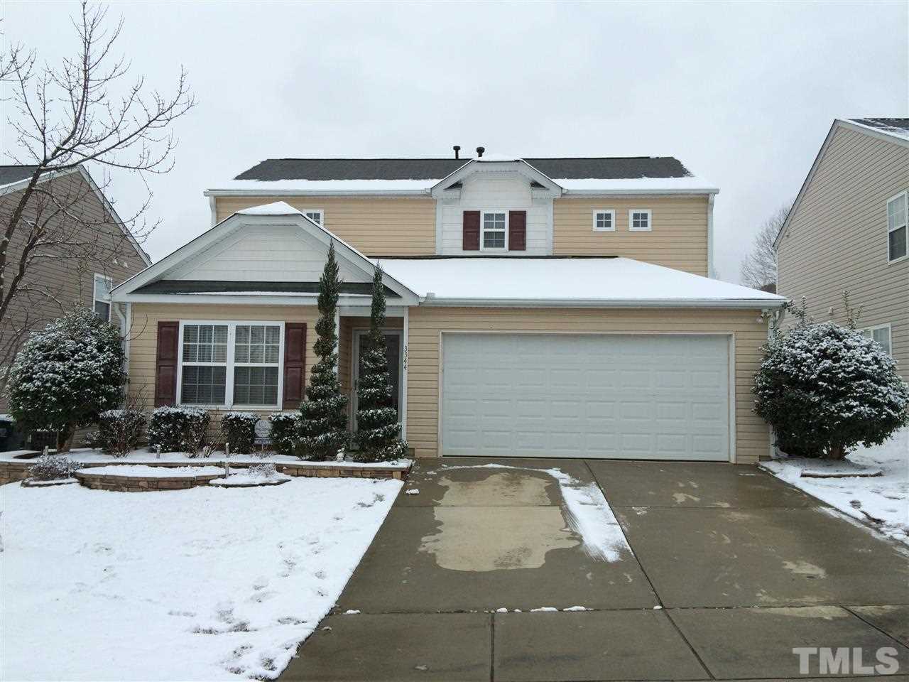 3344 Marshlane Way Raleigh, NC 27610 - Photo 1 of 4 a front view of a house with yard and parking