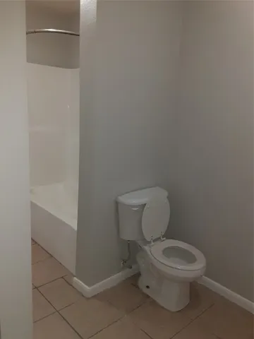 $1 | 134 South Bend Court, Unit B, Willis, TX 77378