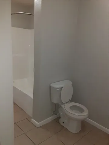 $1 | 134 South Bend Court, Unit A, Willis, TX 77378