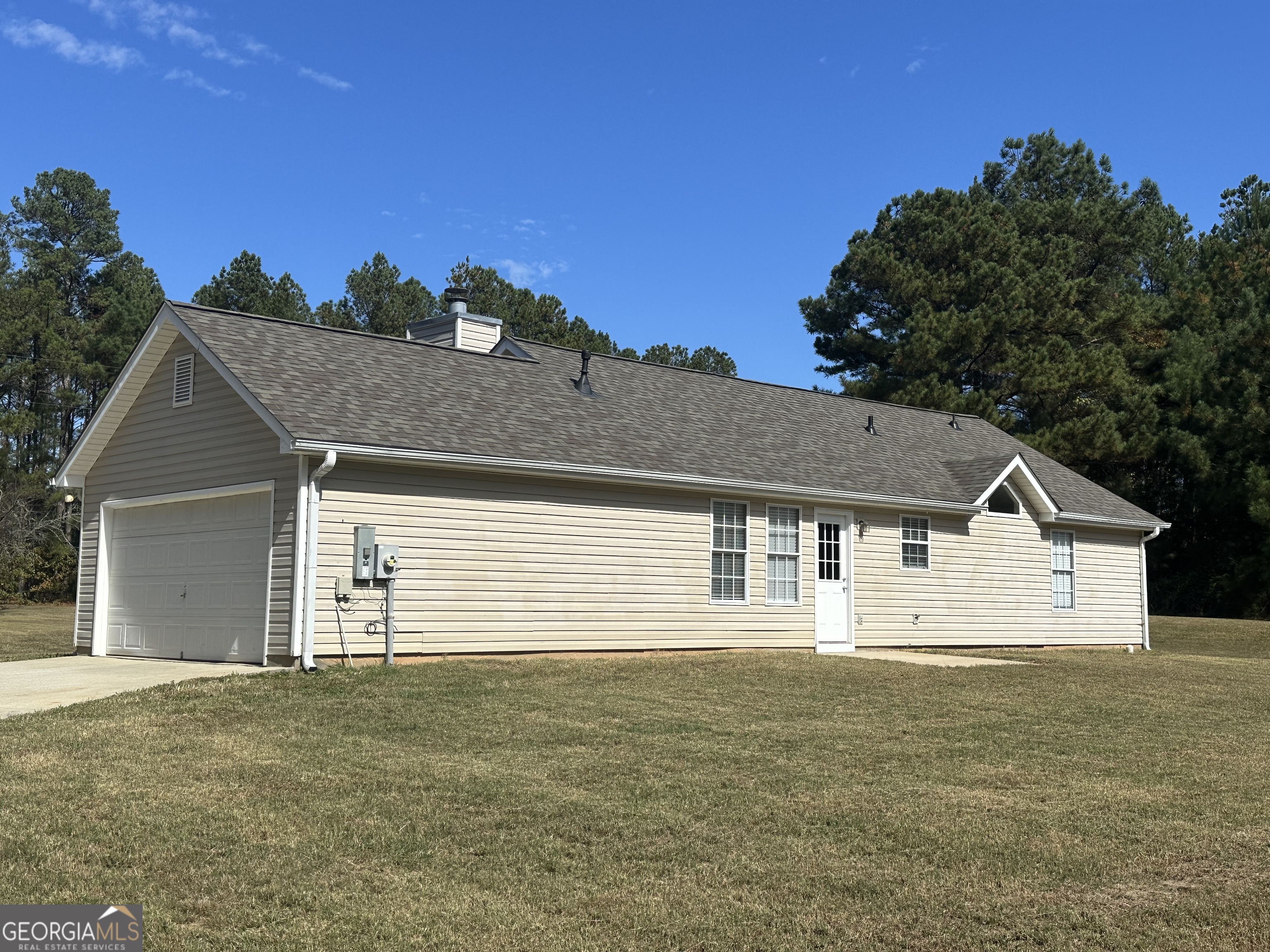 3860 Cedar Rock Road Woodbury, GA 30293 - Photo 13 of 14 a view of a house with a outdoor space