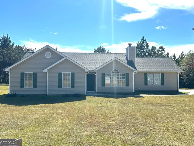a house view with a garden space