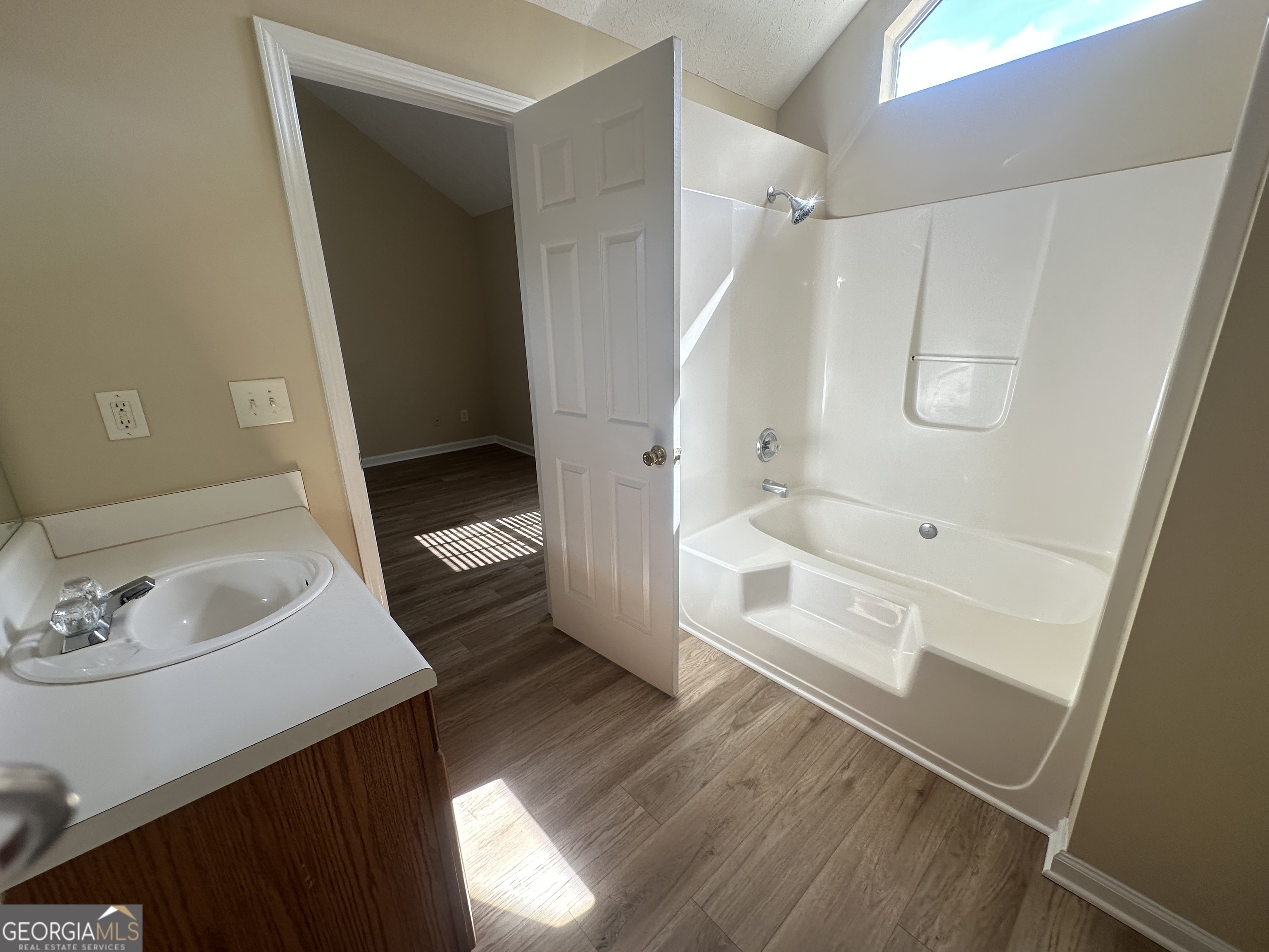 3860 Cedar Rock Road Woodbury, GA 30293 - Photo 7 of 14 a bathroom with a sink a toilet and shower