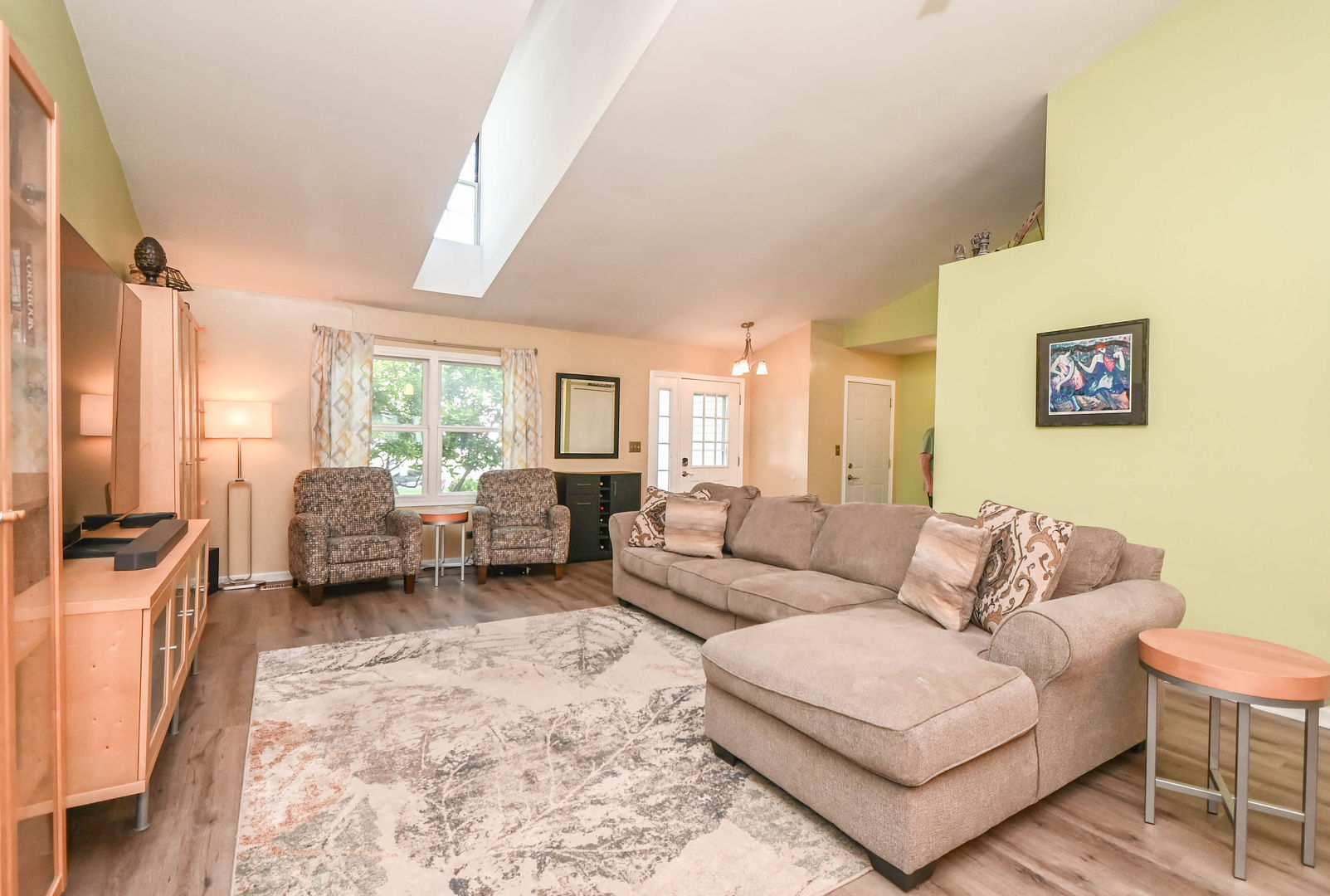 1333 Regency Lane Round Lake, IL 60073 - Photo 9 of 31 a living room with furniture and a large window
