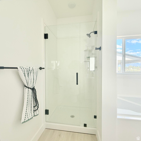 5777 West 4100 South Hooper, UT 84315 - Photo 25 of 41 Glass-enclosed shower with matte black fixtures and a white shower pan