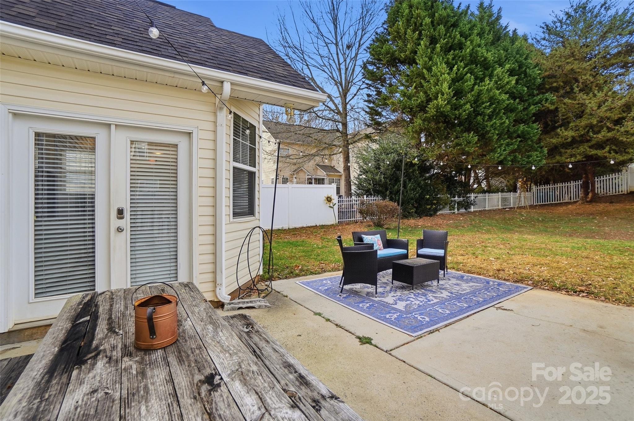 10432 Watoga Way Cornelius, NC 28031 - Photo 35 of 42 a front view of a house with swimming pool and furniture