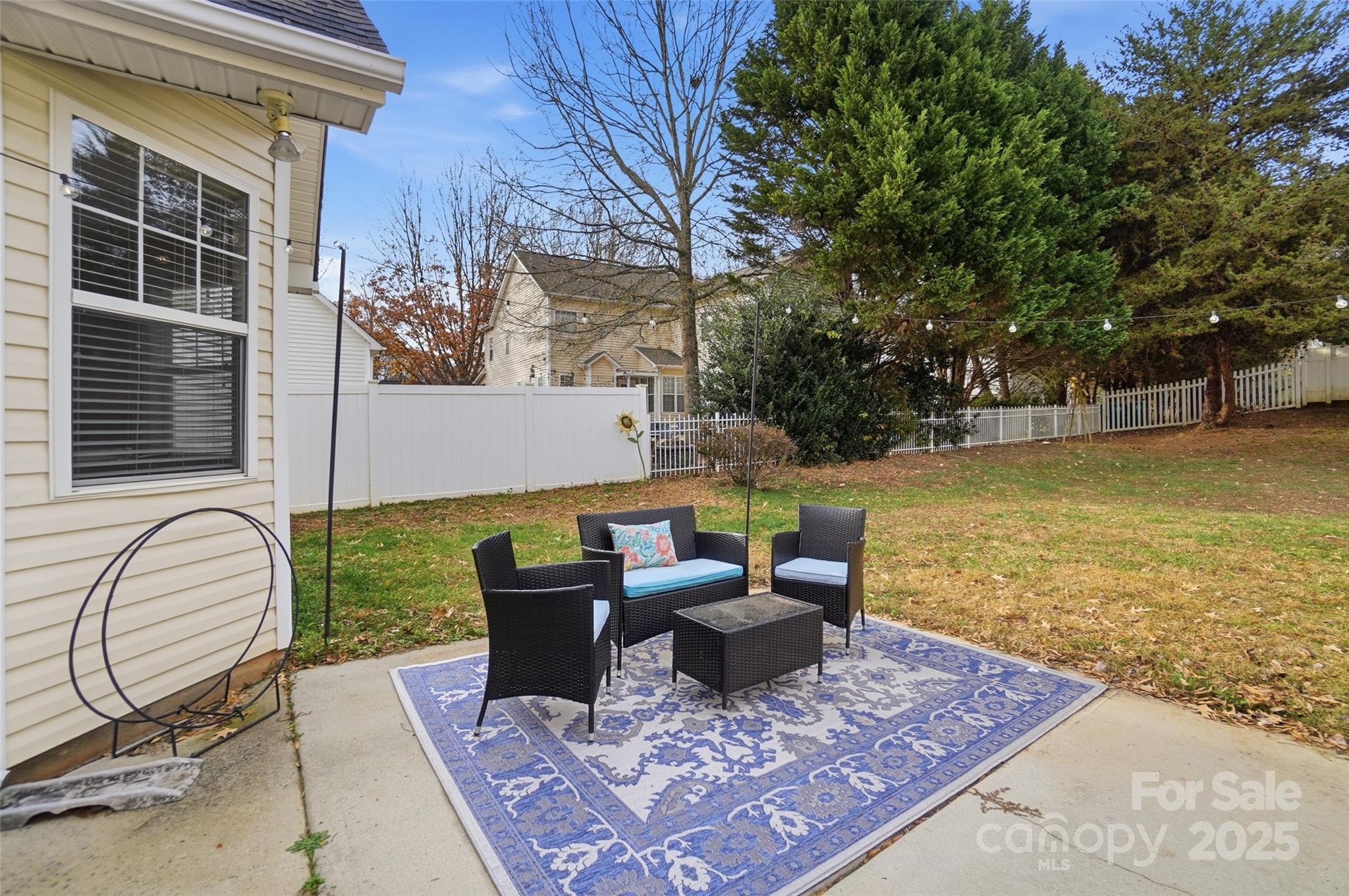 10432 Watoga Way Cornelius, NC 28031 - Photo 36 of 42 a view of a backyard with sitting area